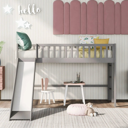 Twin size low loft bed with ladder and slide gray frame pink wall panels and white slide on Tampa Home & Garden Store