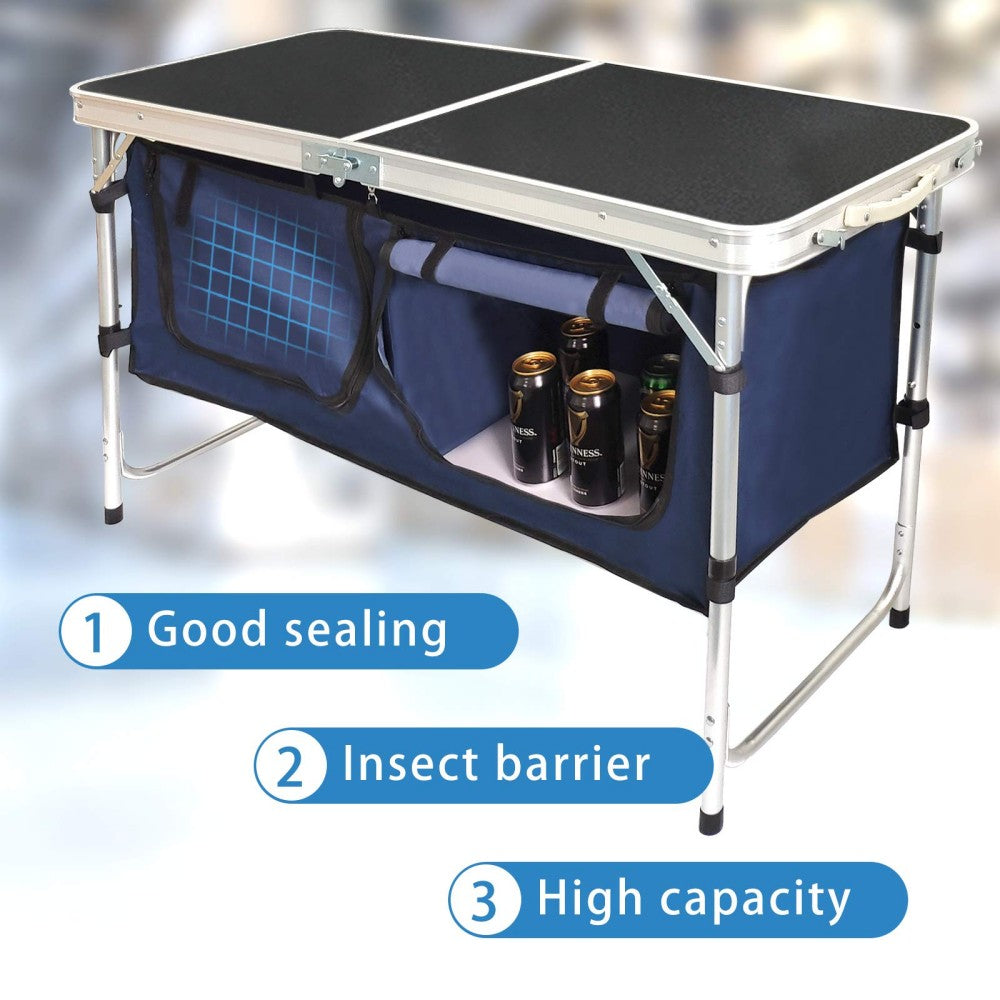 Folding camping table and storage compartment