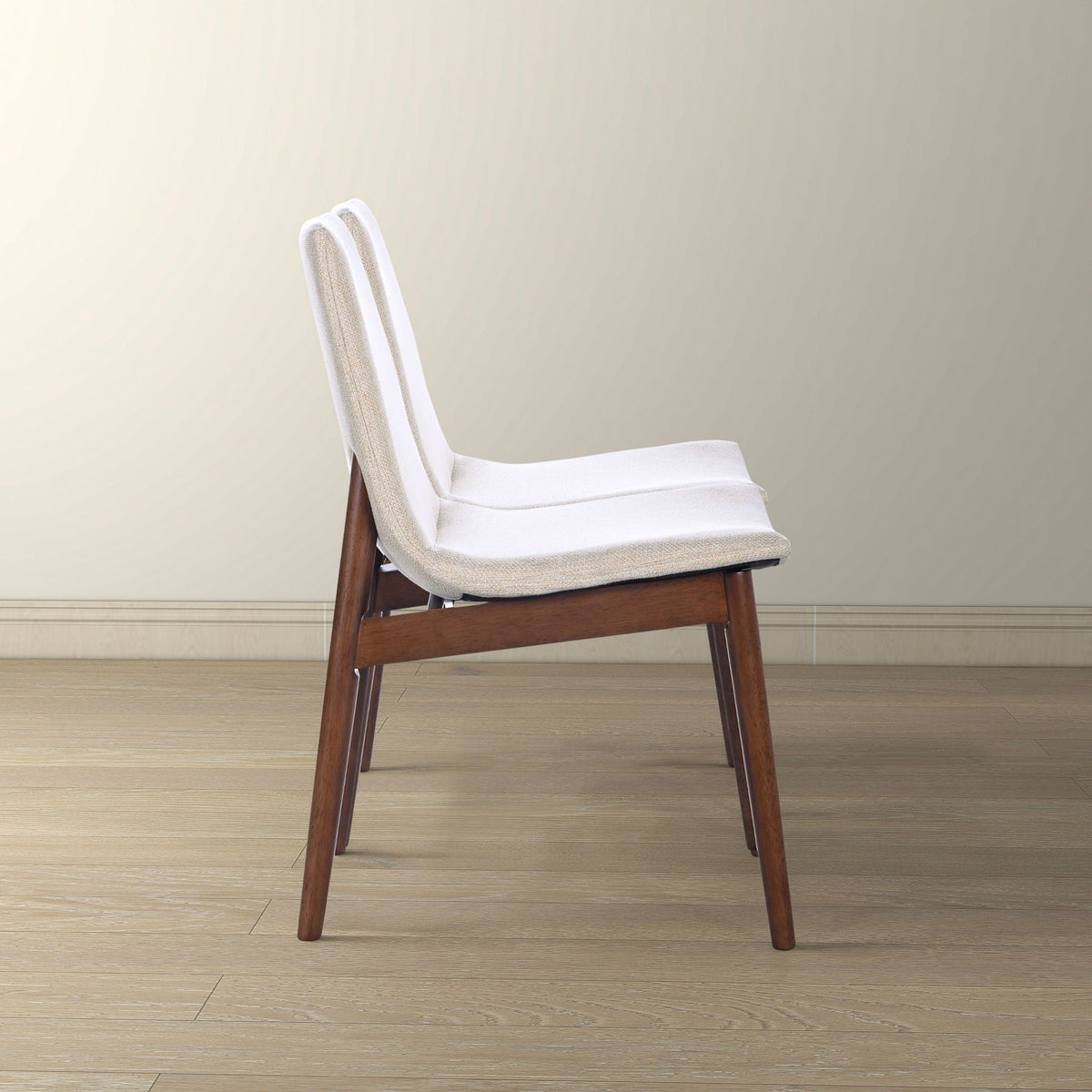 Beige dining chair with solid wood frame and beige fabric upholstery on Tampa Home & Garden Store
