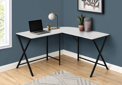 L-shaped corner computer desk with white top and black metal legs, laptop, lamp, plant on blue wall on Tampa Home & Garden Store