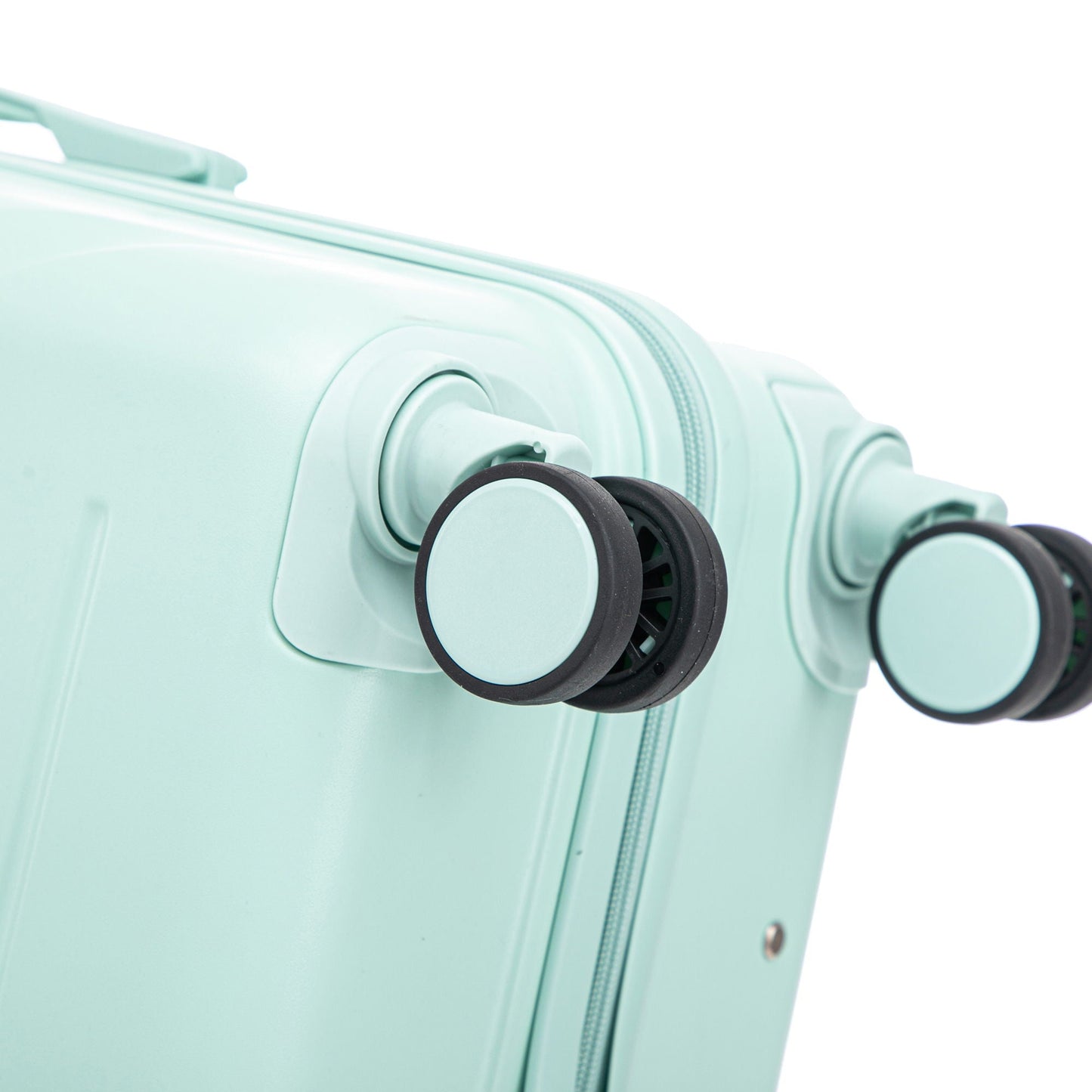Mint green 3-piece spinner luggage set wheels close-up with zipper and handles on Tampa Home & Garden Store