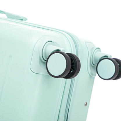 Mint green 3-piece spinner luggage set wheels close-up with zipper and handles on Tampa Home & Garden Store