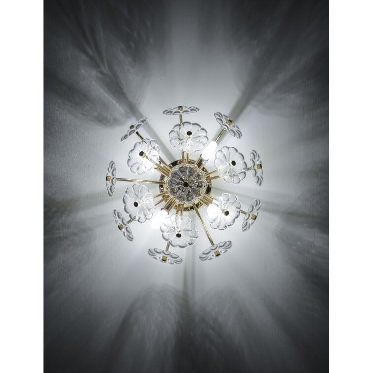 Gold flush mount ceiling light with glass flower petals and brass central hub on Tampa Home & Garden Store