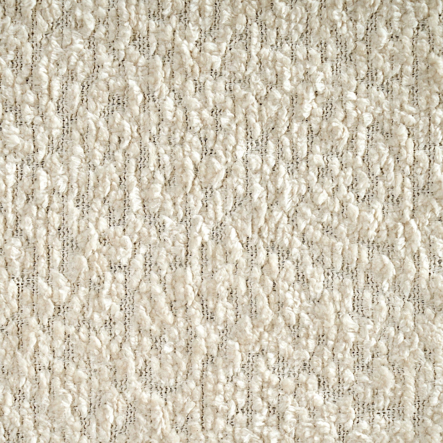 Beige textured carpet close-up with looped pile and soft fibers on Tampa Home & Garden Store