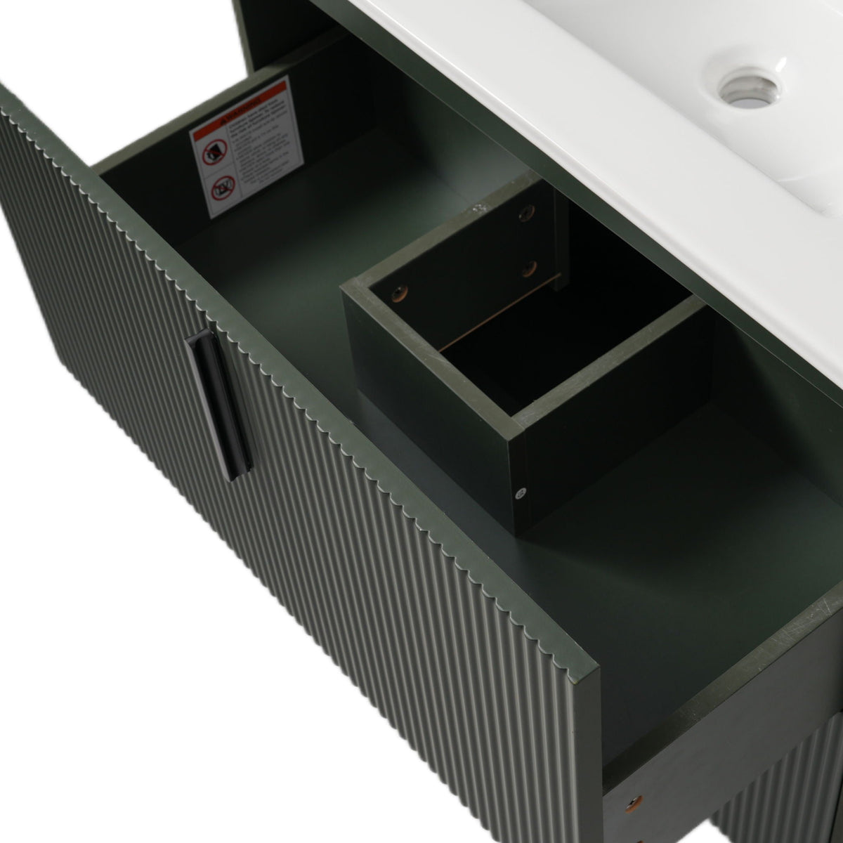 Bathroom vanity with ceramic sink, dark green fluted cabinet and white countertop on Tampa Home & Garden Store