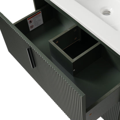 Bathroom vanity with ceramic sink, dark green fluted cabinet and white countertop on Tampa Home & Garden Store