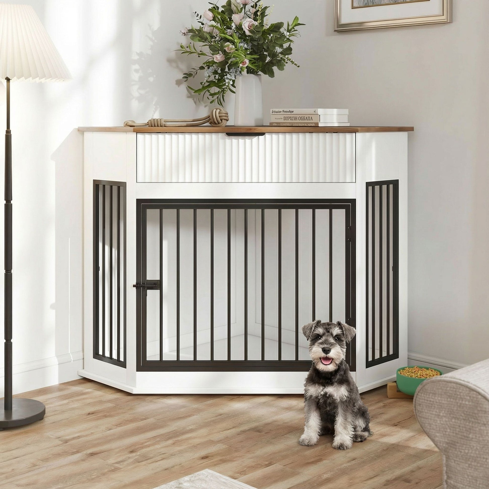 Corner dog crate by HouseOfZazla, black metal frame with white panels and wood top, dog nearby on Tampa Home & Garden Store