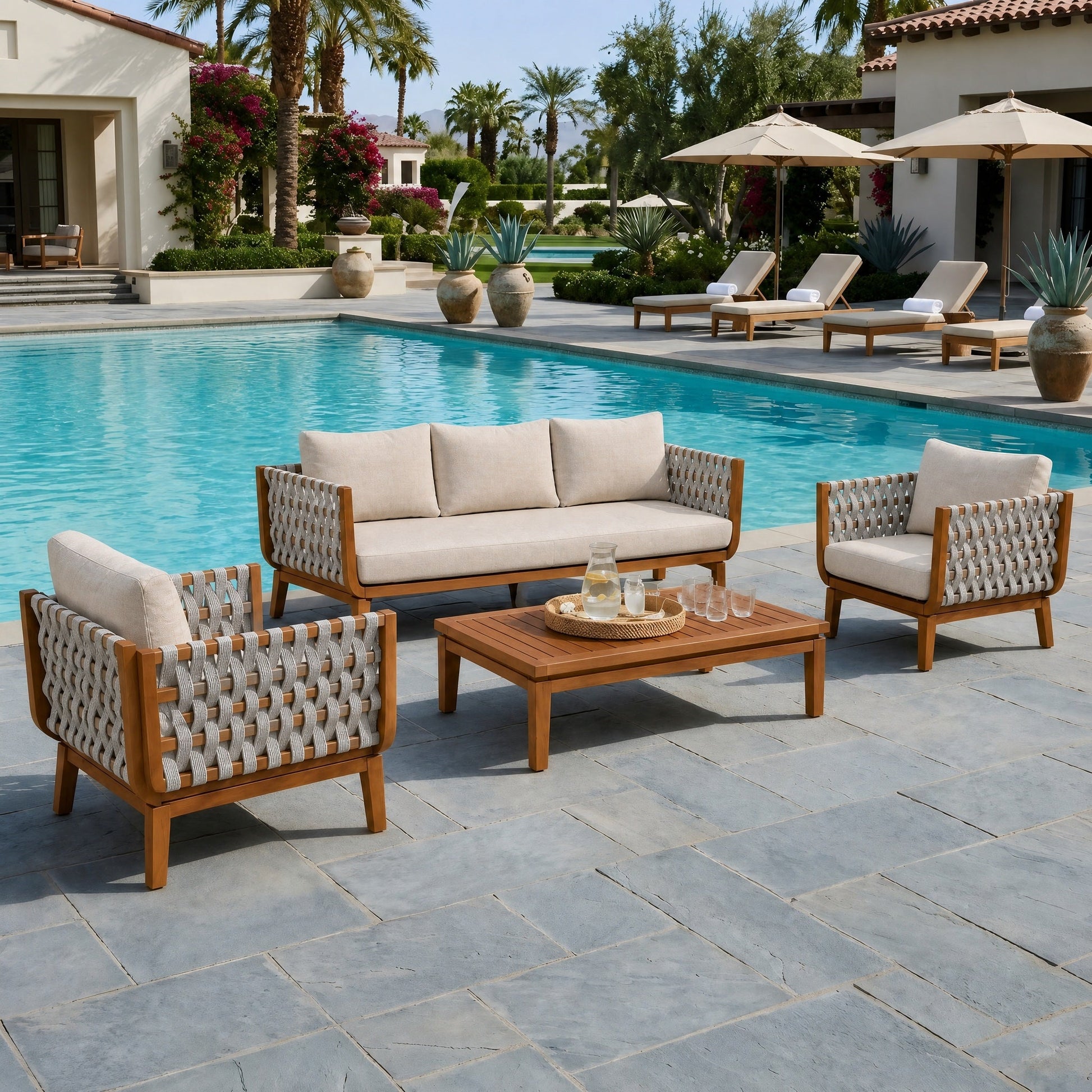 4-piece HouseOfZazla outdoor patio furniture set with cushions and woven rope-back chairs by pool on Tampa Home & Garden Store