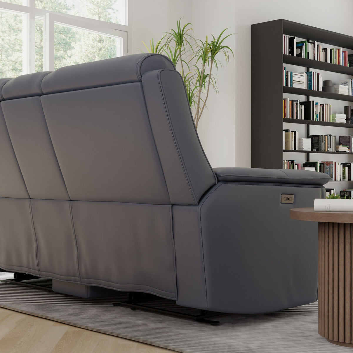 Dual power reclining loveseat with center console in gray leather on Tampa Home & Garden Store