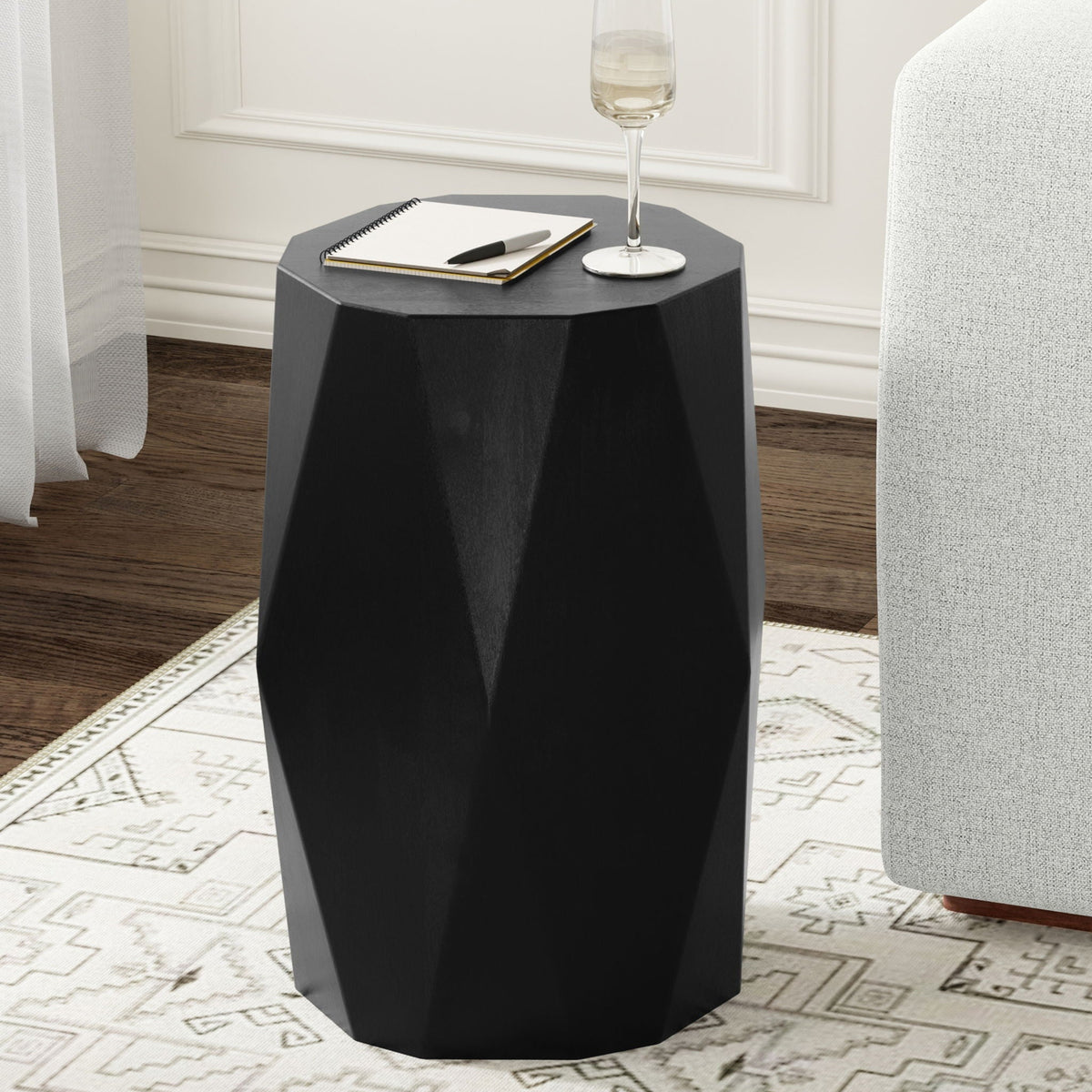 Judson Side Table black hexagonal surface with notebook, pen, and wine glass on top on Tampa Home & Garden Store