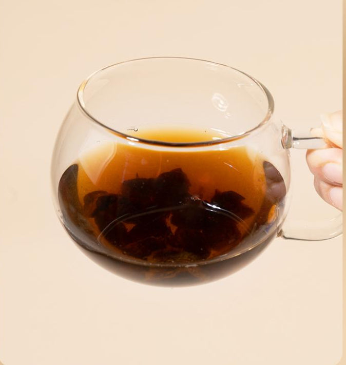 Yuling American Ginseng Longan Cinnamon Lotus Seed herbal tea by Perfecsy in a glass cup on Tampa Home & Garden Store