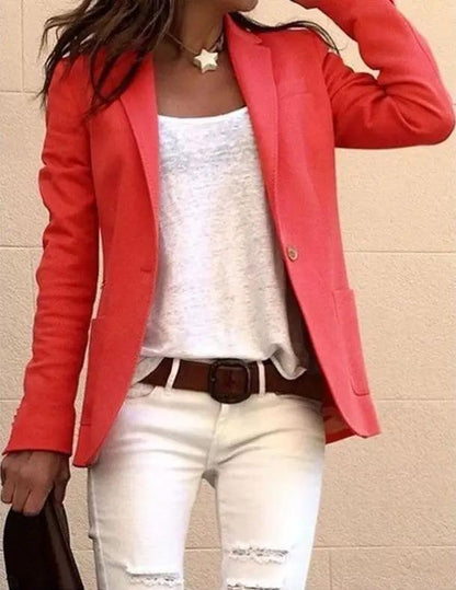 Candy-colored blazer with white top and ripped jeans, brown belt, star necklace on Tampa Home & Garden Store