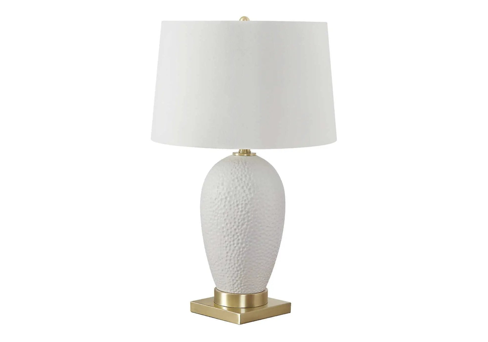 Table lamp, ceramic textured white base with brass accents and white shade on Tampa Home & Garden Store
