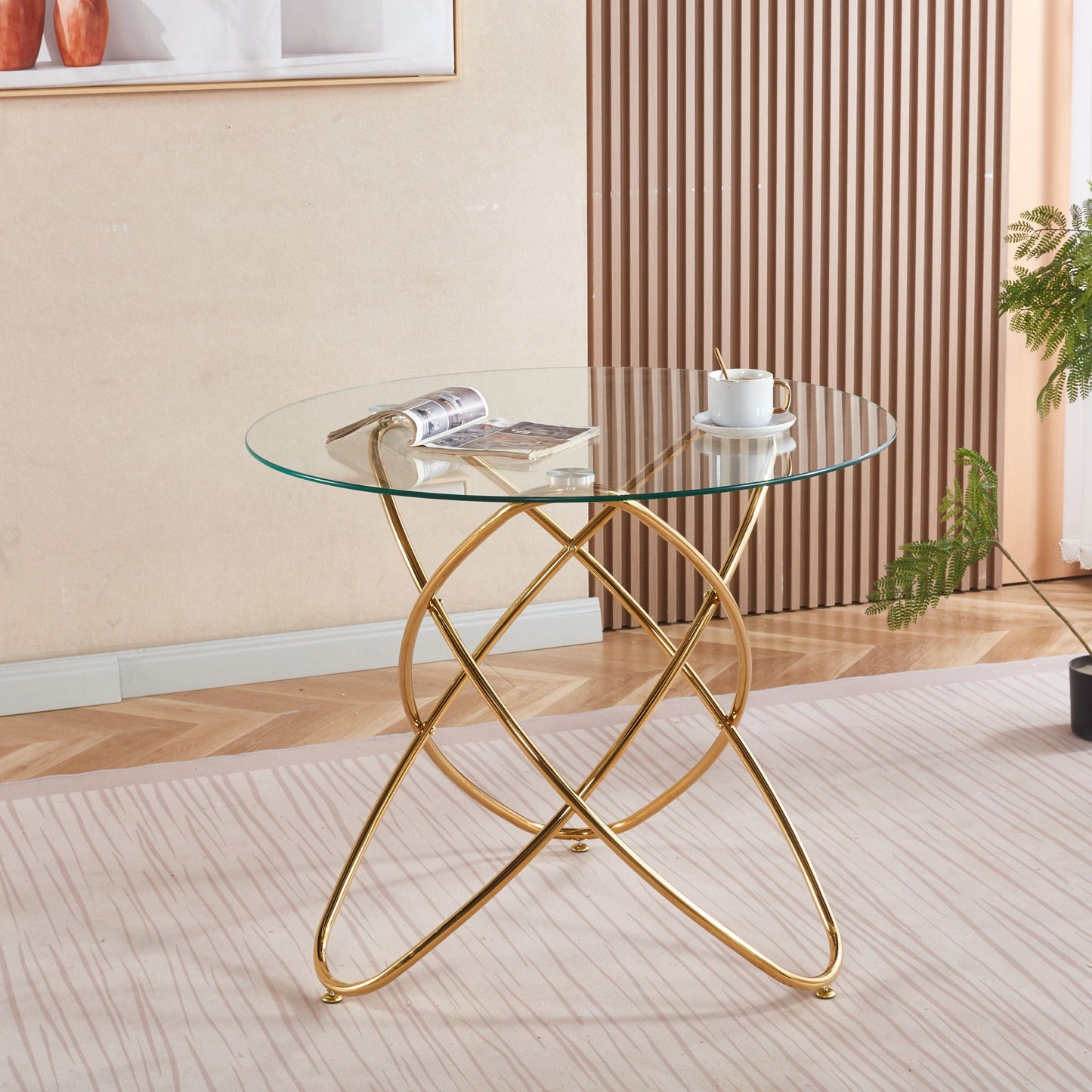 Round tempered glass dining table with gold metal legs by HouseOfZazla on Tampa Home & Garden Store