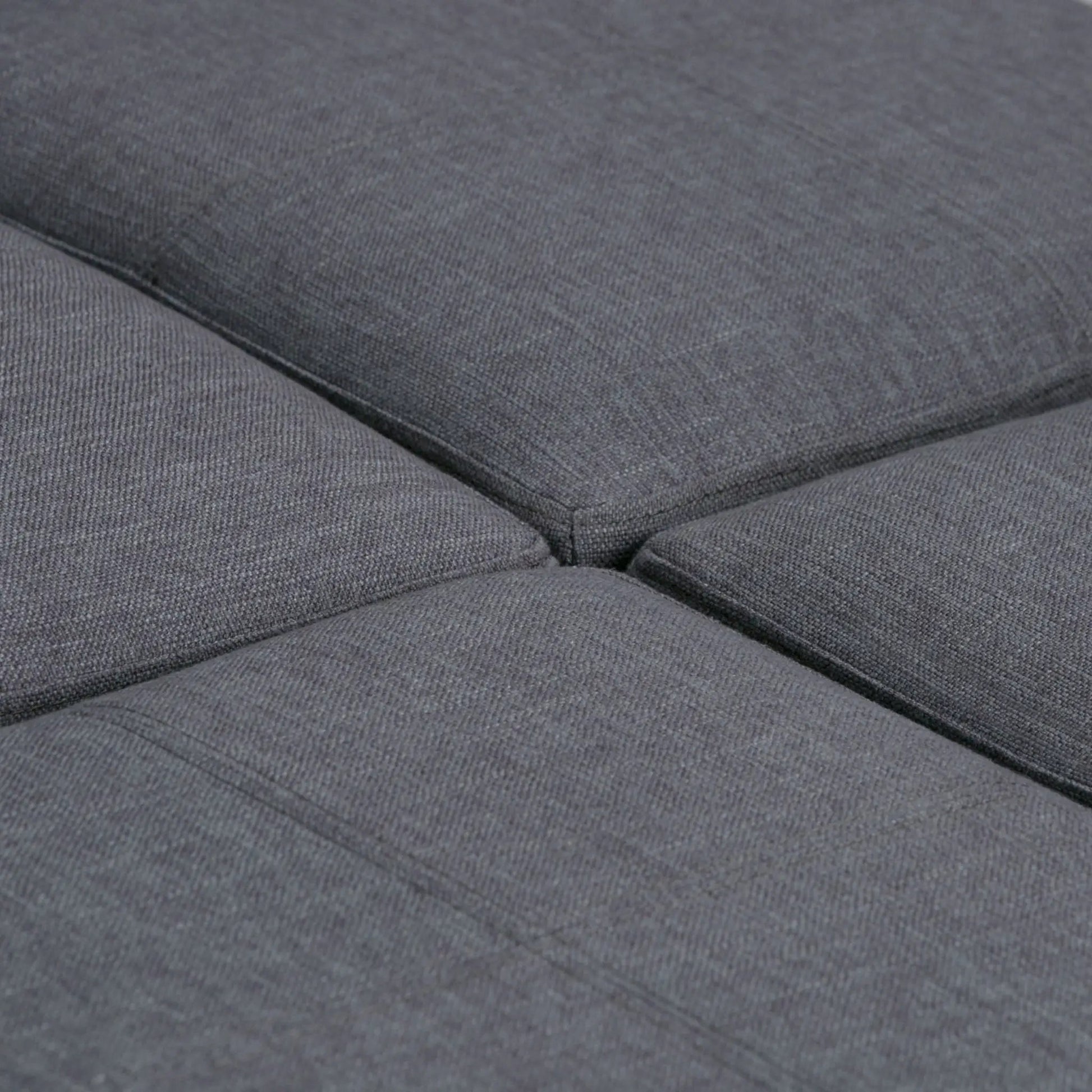 Storage ottoman close-up in charcoal gray woven fabric on Tampa Home & Garden Store