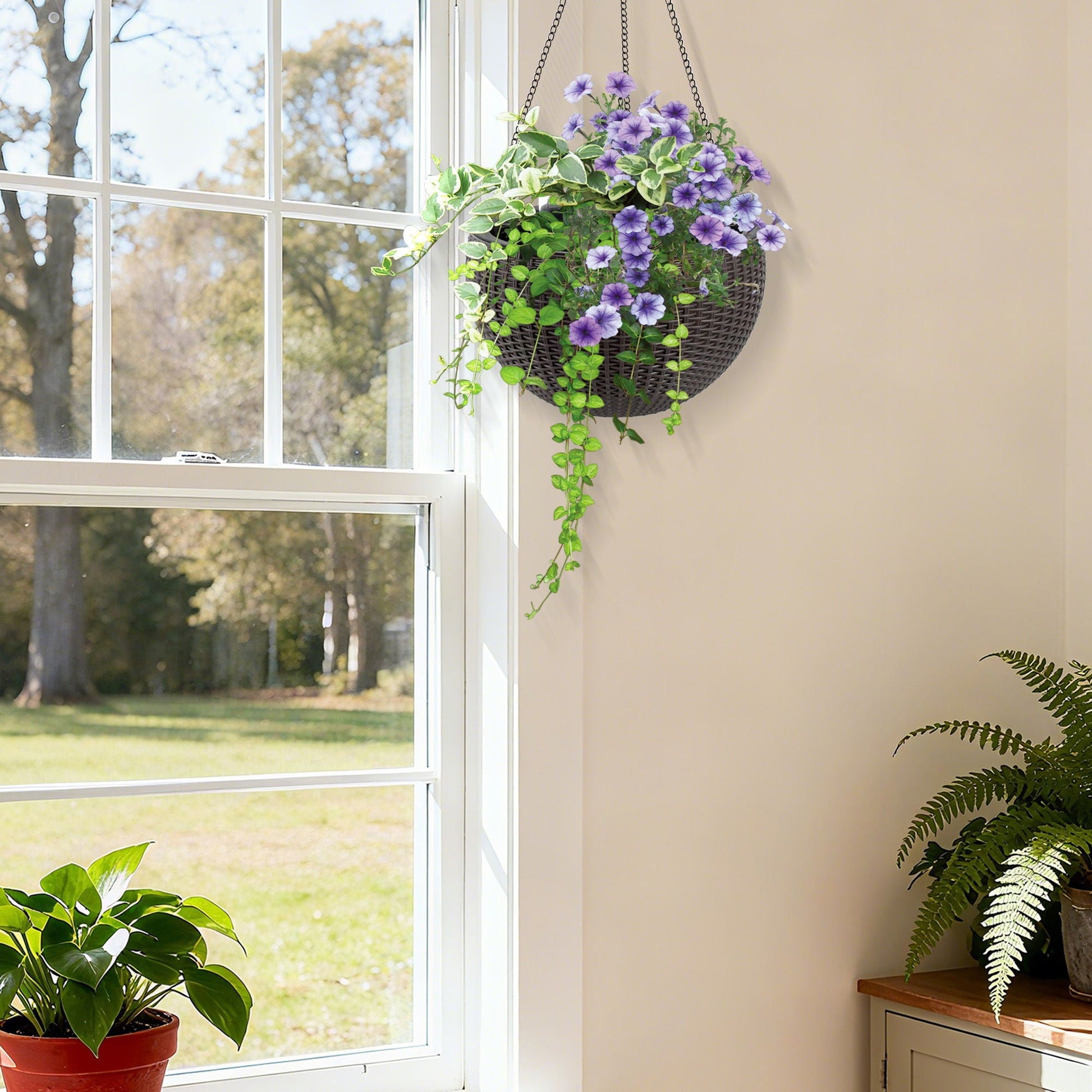 Self Watering Hanging Planter in dark wicker with purple petunias by HouseOfZazla on Tampa Home & Garden Store