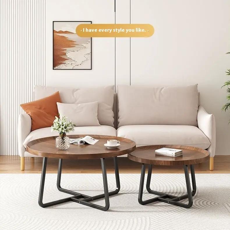 Light luxury round solid wood tea tables, two nested coffee tables with black metal legs on Tampa Home & Garden Store