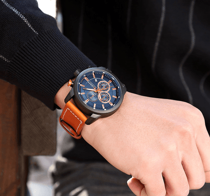 Stevvex men's waterproof sport watch with chronograph day view, blue dial, orange leather strap on Tampa Home & Garden Store