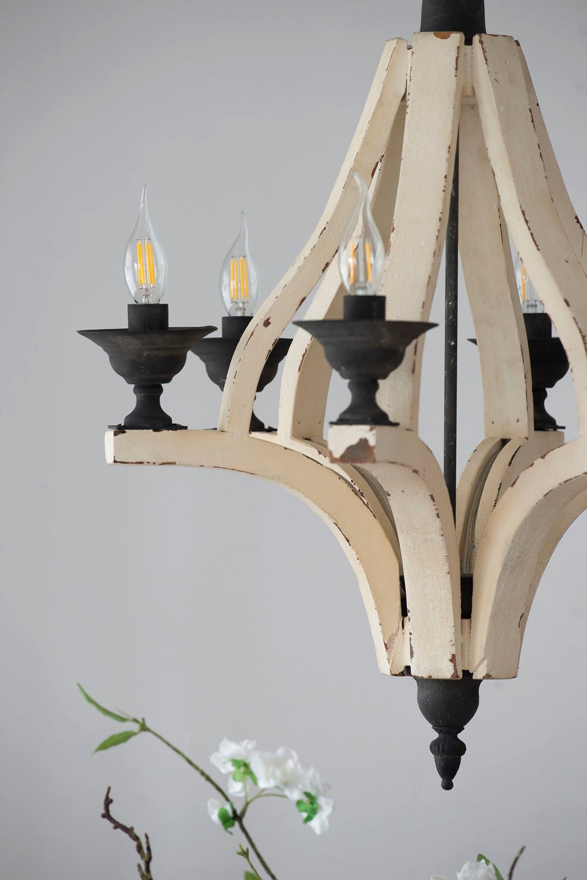 6-light cream distressed wood chandelier with black candle cups and filament bulbs on Tampa Home & Garden Store