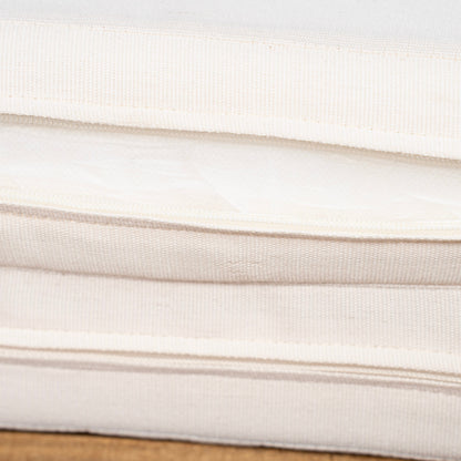 Sun lounger cushion fabric close-up in cream with woven texture on Tampa Home & Garden Store