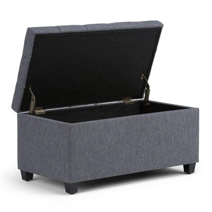 Sienna upholstered storage ottoman bench in gray fabric with open lid and black interior on Tampa Home & Garden Store