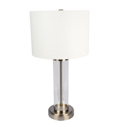 Luna table lamp with clear glass body and brass base, white fabric shade on Tampa Home & Garden Store