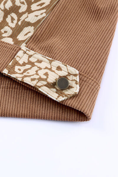 Leopard print drop shoulder jacket cuff detail with brown rib-knit sleeve and metal snap button on Tampa Home & Garden Store