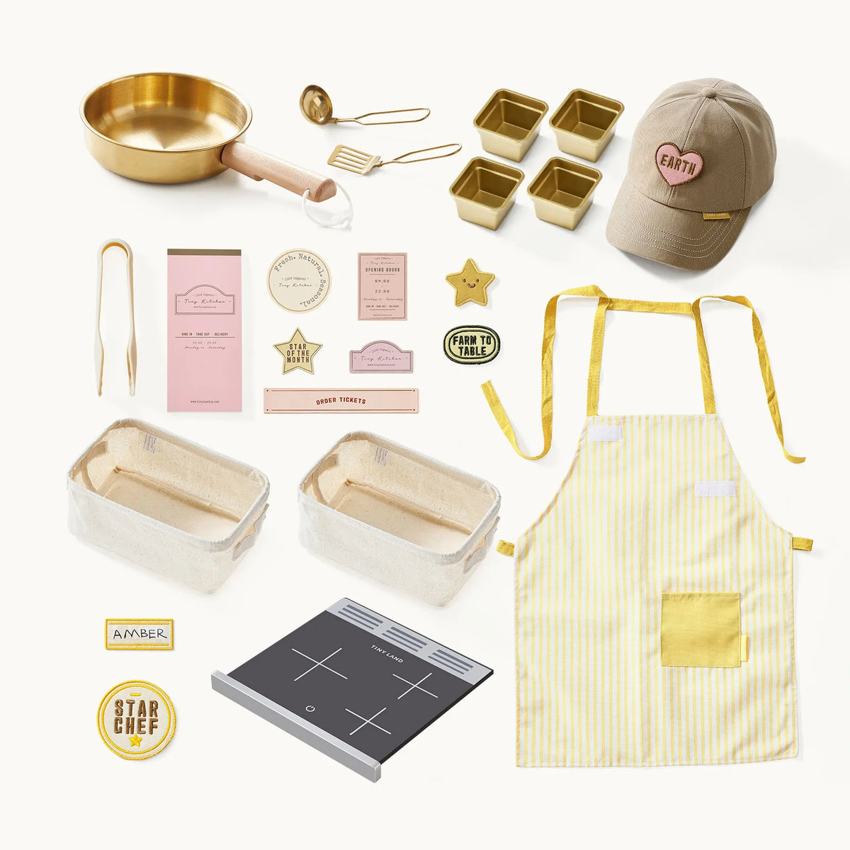Tiny Land INC BistroSwitch Play Kitchen set with gold pans, utensils, yellow striped apron on Tampa Home & Garden Store