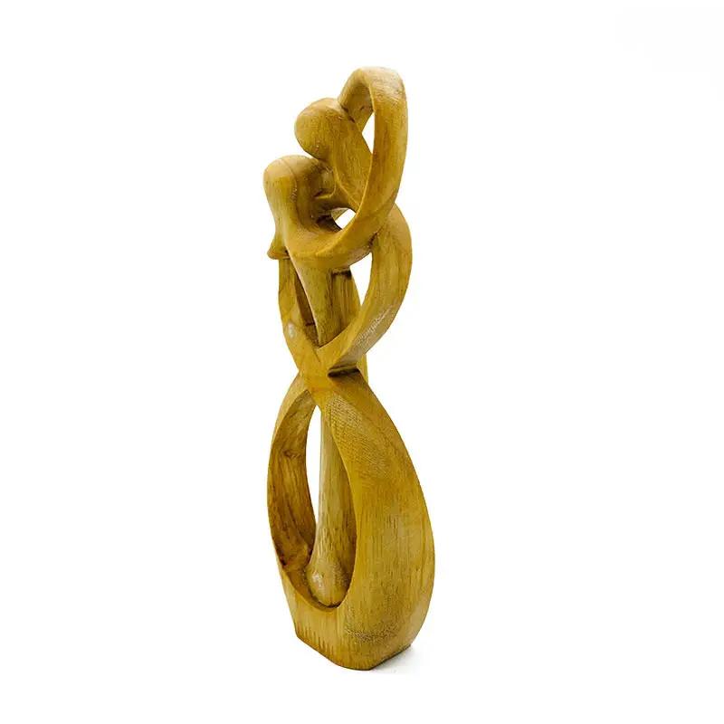 Wooden Love Eternal sculpture entwined lovers natural wood finish FLIPSTYLEZLLC on Tampa Home & Garden Store
