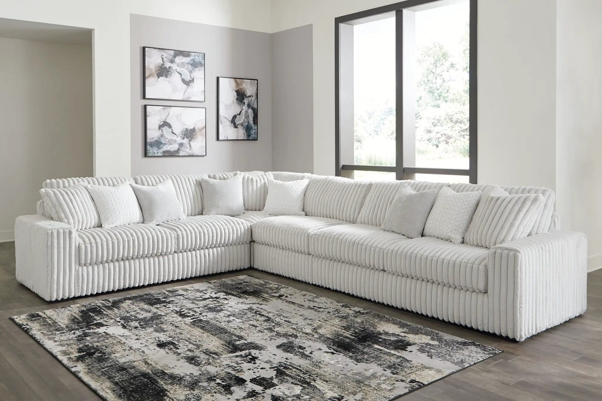Stupendous Sectional light gray ribbed fabric stationary sofa in an L-shaped living room on Tampa Home & Garden Store