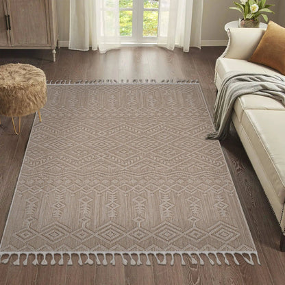 Guros traditional indoor/outdoor area rug beige with diamond motif and fringe tassels on dark wood floor on Tampa Home & Garden Store