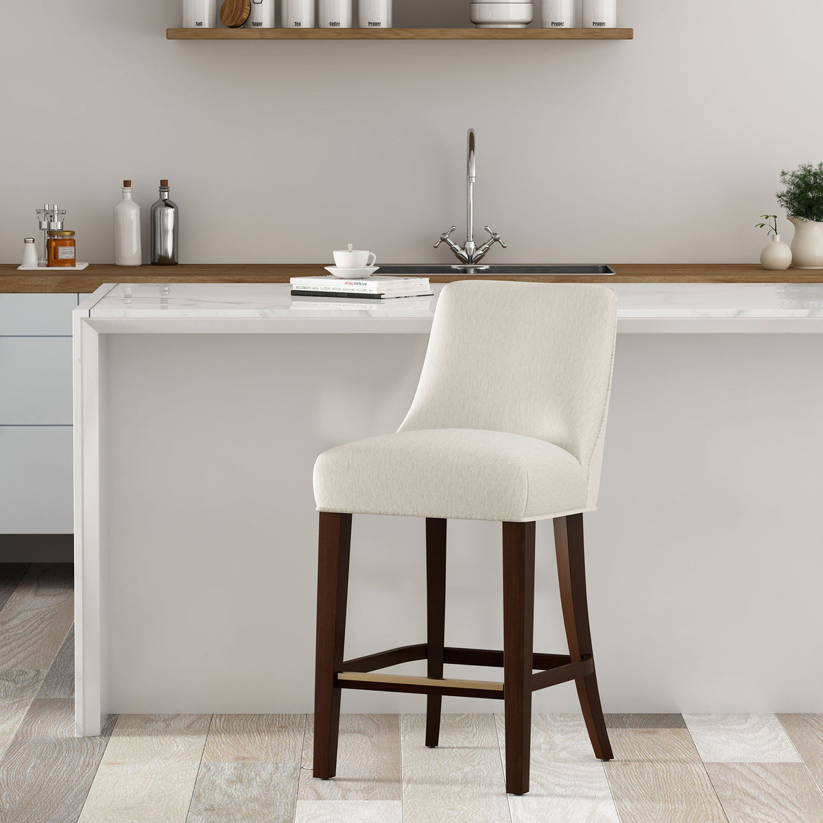 Upholstered counter stool with backrest and footrest in beige fabric, dark wood legs on Tampa Home & Garden Store