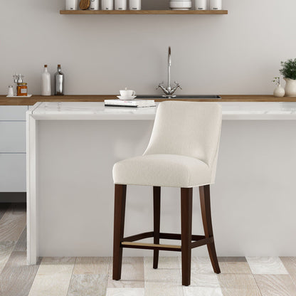 Upholstered counter stool with backrest and footrest in beige fabric, dark wood legs on Tampa Home & Garden Store