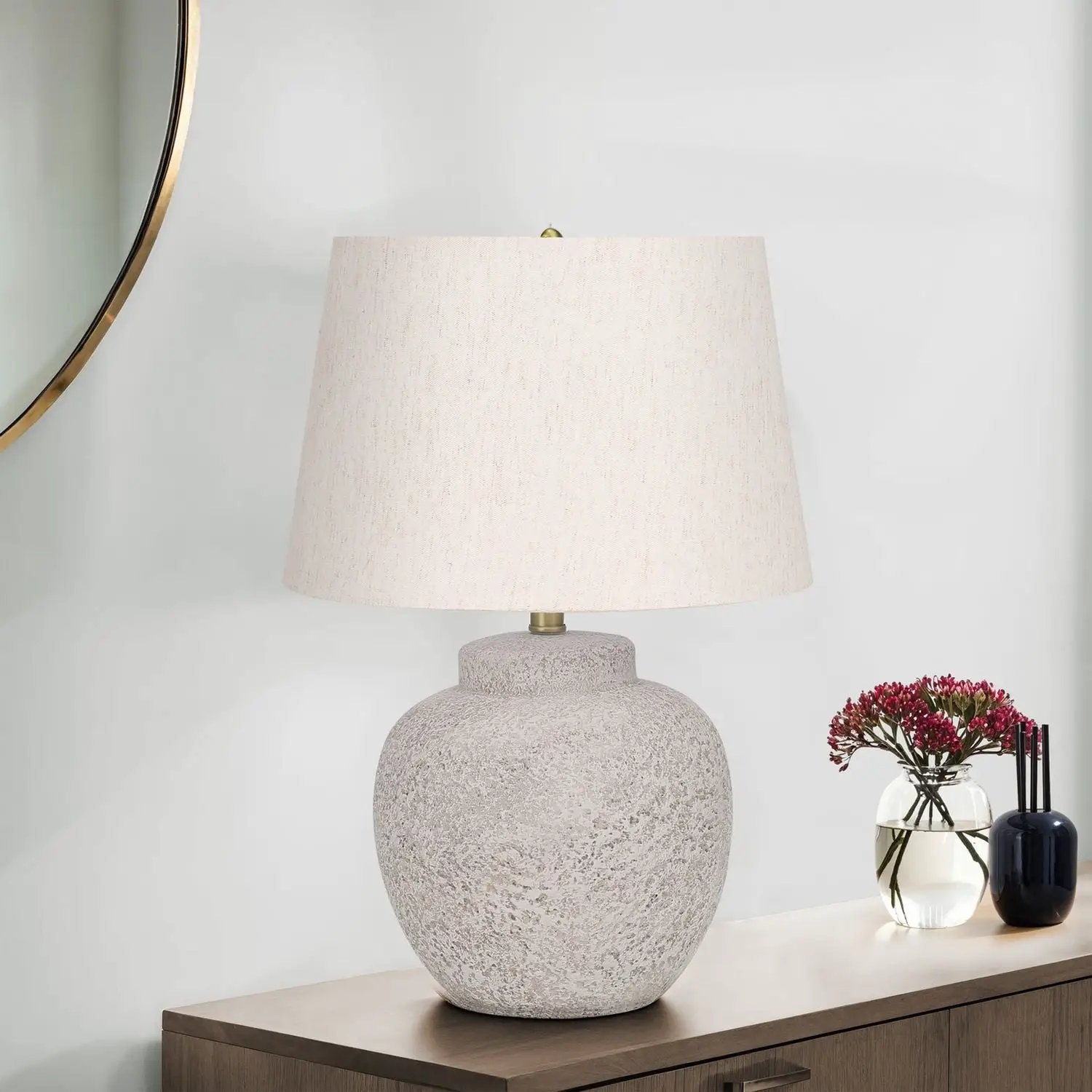 Table lamp with cream shade and textured concrete base on console by Unique Piece Furniture on Tampa Home & Garden Store