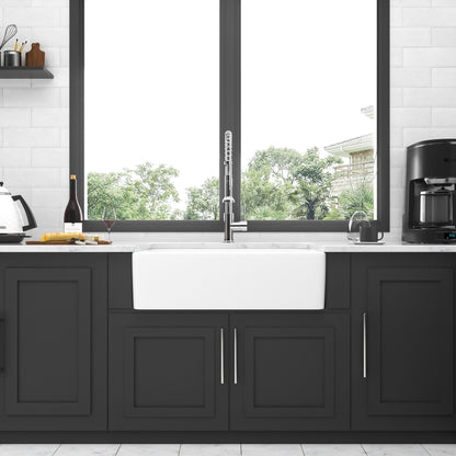 Elegant farmhouse apron-front ceramic kitchen sink, white single bowl with dark cabinetry on Tampa Home & Garden Store