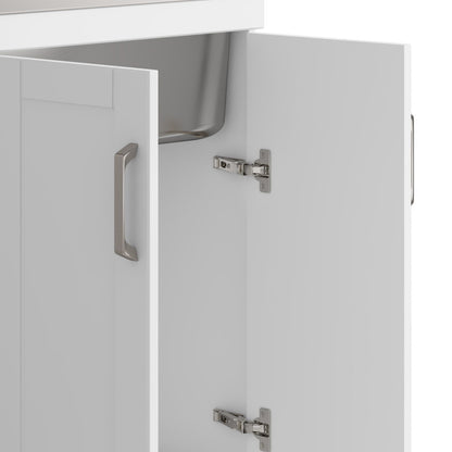 White laundry cabinet with stainless steel sink, open doors, brushed nickel handles on Tampa Home & Garden Store