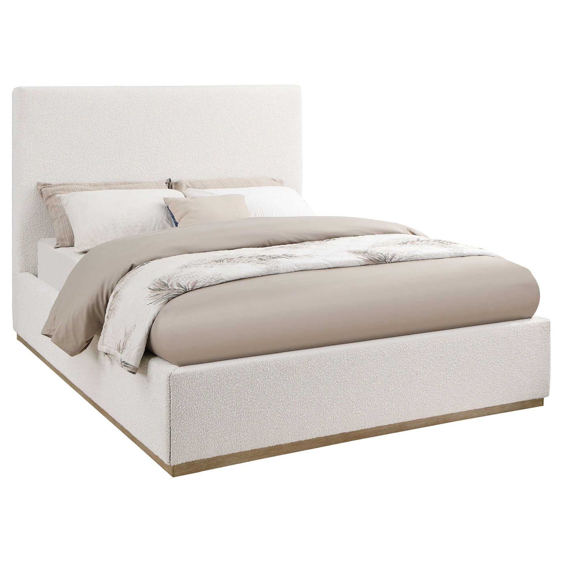 Othello cream upholstered platform bed with tall textured headboard and neutral bedding on Tampa Home & Garden Store