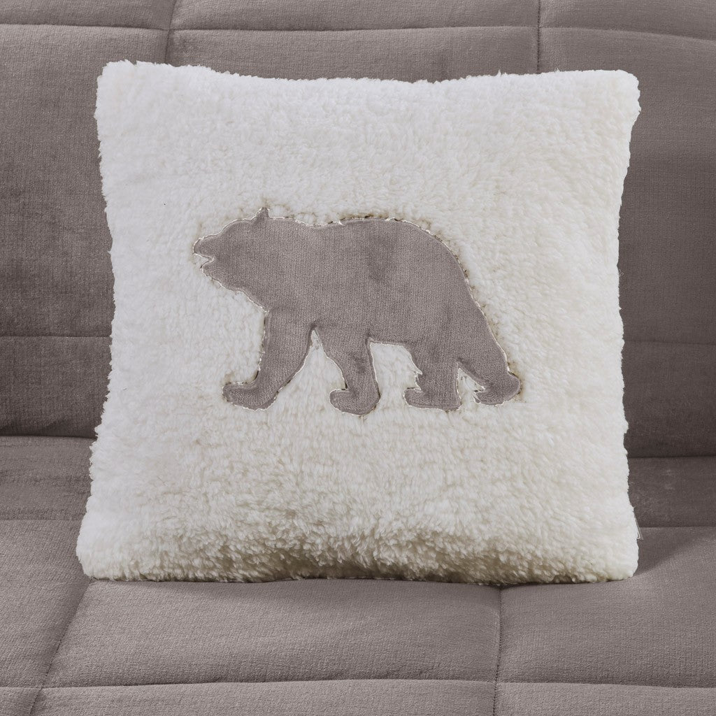 Decorative white sherpa throw pillow with a gray bear silhouette applique on Tampa Home & Garden Store