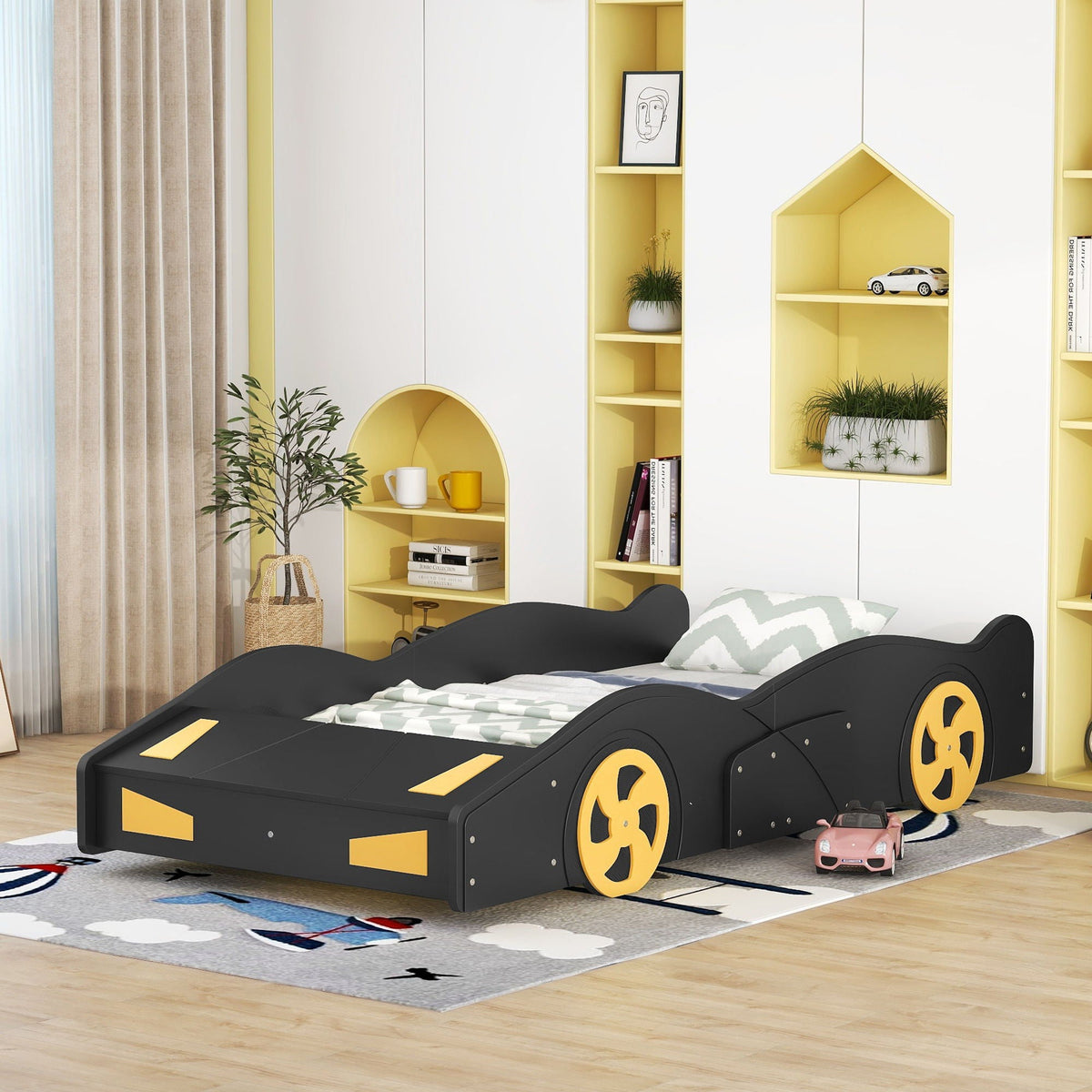 Pair of black race car shaped platform beds with storage and yellow wheels on Tampa Home & Garden Store