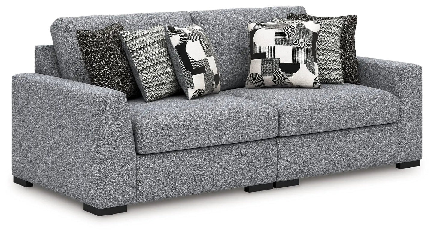 Bealton sectional by Unique Piece Furniture gray textured upholstery with geometric pillows on Tampa Home & Garden Store