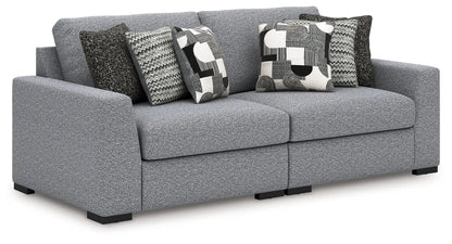 Bealton sectional by Unique Piece Furniture gray textured upholstery with geometric pillows on Tampa Home & Garden Store