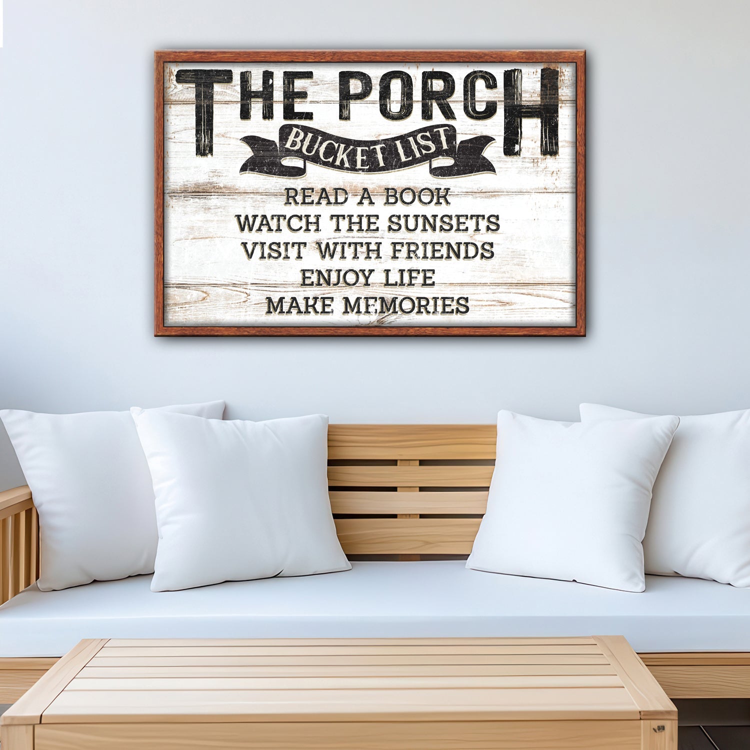 Canvas sign The Porch Bucket List with rustic wood backdrop and black distressed text framed on Tampa Home & Garden Store