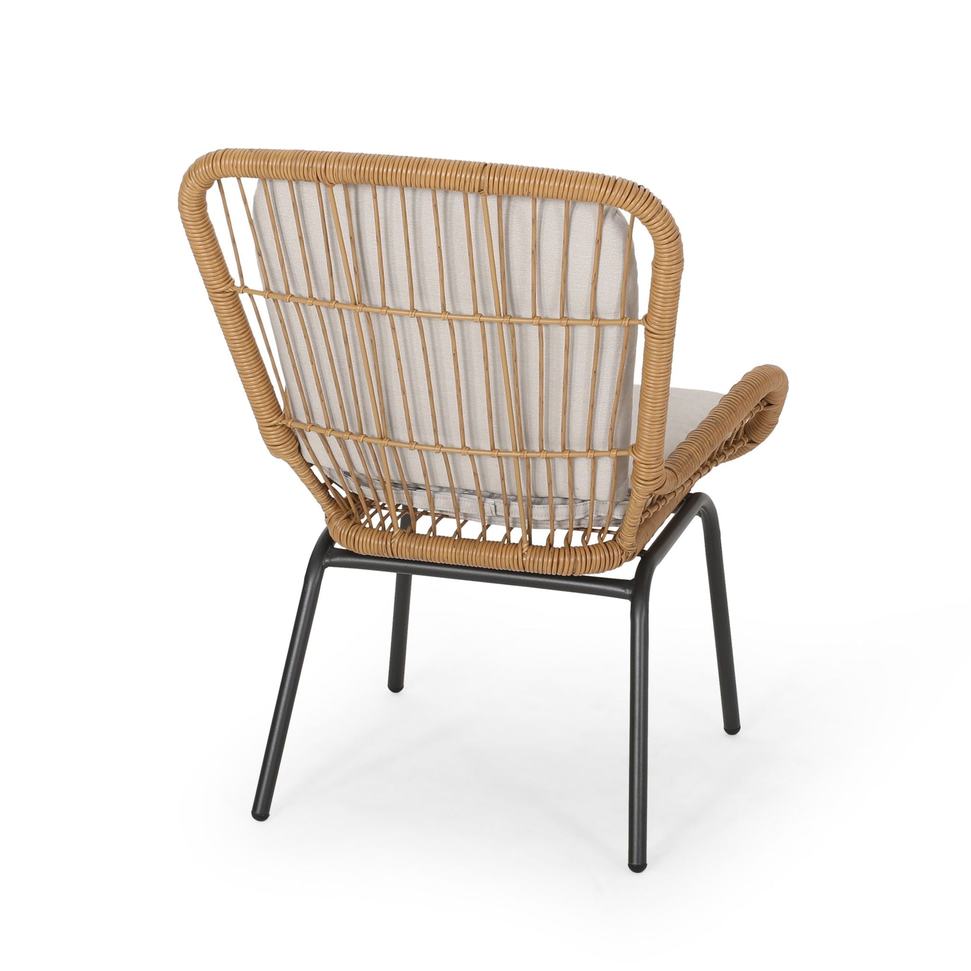 Outdoor wicker club chair with beige cushions and black metal legs on Tampa Home & Garden Store