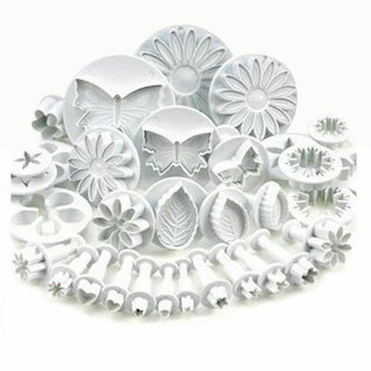 33pc fondant cutter set with butterfly, flower and leaf molds in white plastic bakeware on Tampa Home & Garden Store
