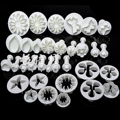 33pc fondant cutter set white plastic with flower, leaf, bow shapes and plunger molds Stevvex on Tampa Home & Garden Store