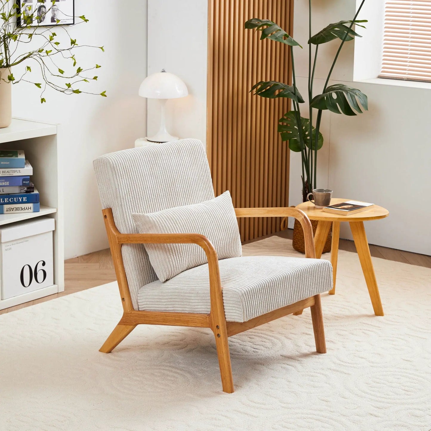 Accent arm chairs upholstered in striped fabric with pillows, light wood frames on Tampa Home & Garden Store