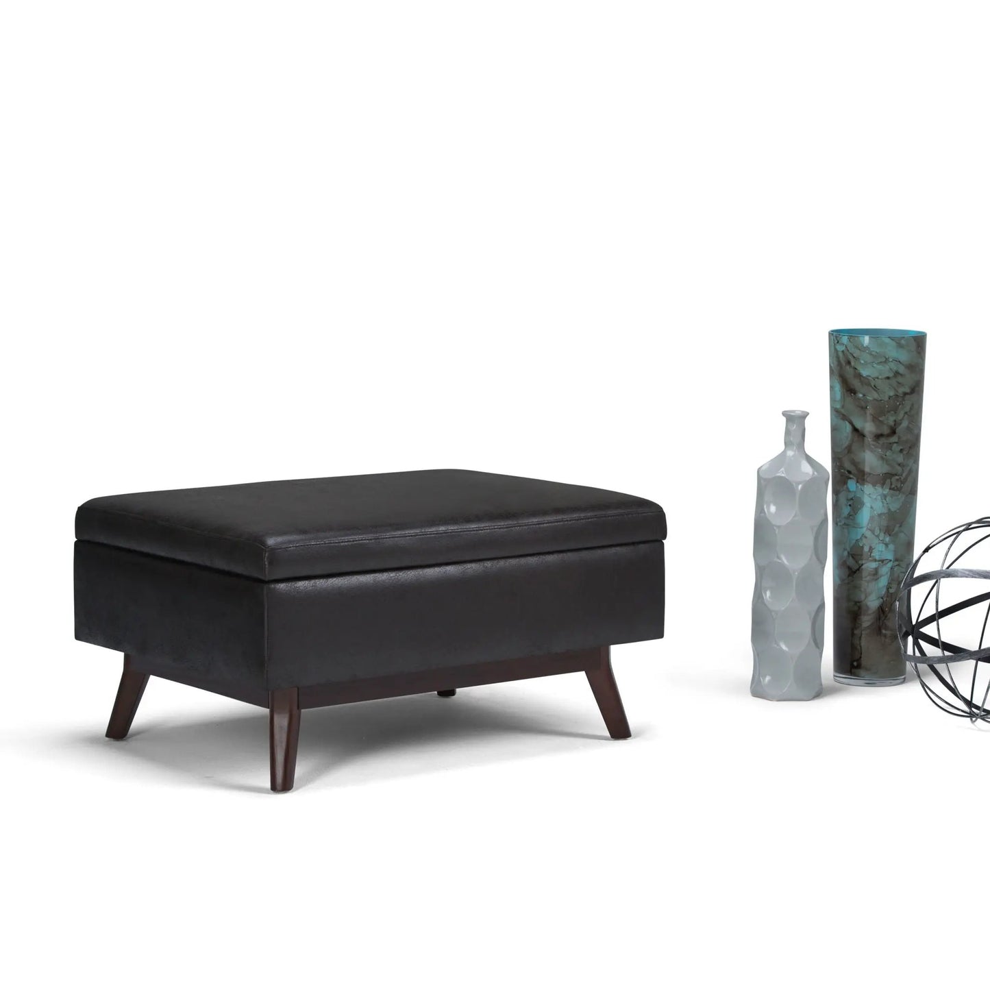 Owen upholstered rectangular storage ottoman in black with dark wood legs on Tampa Home & Garden Store