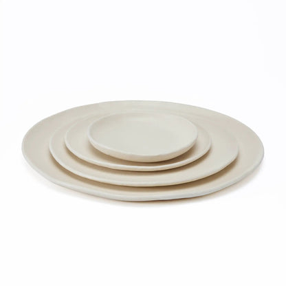 Kodo 4-piece place setting ivory ceramic dumæ dinnerware set on Tampa Home & Garden Store