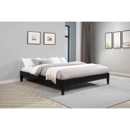 Hounslow platform bed by HouseOfZazla in black wood with white-gray bedding and cream throw on Tampa Home & Garden Store