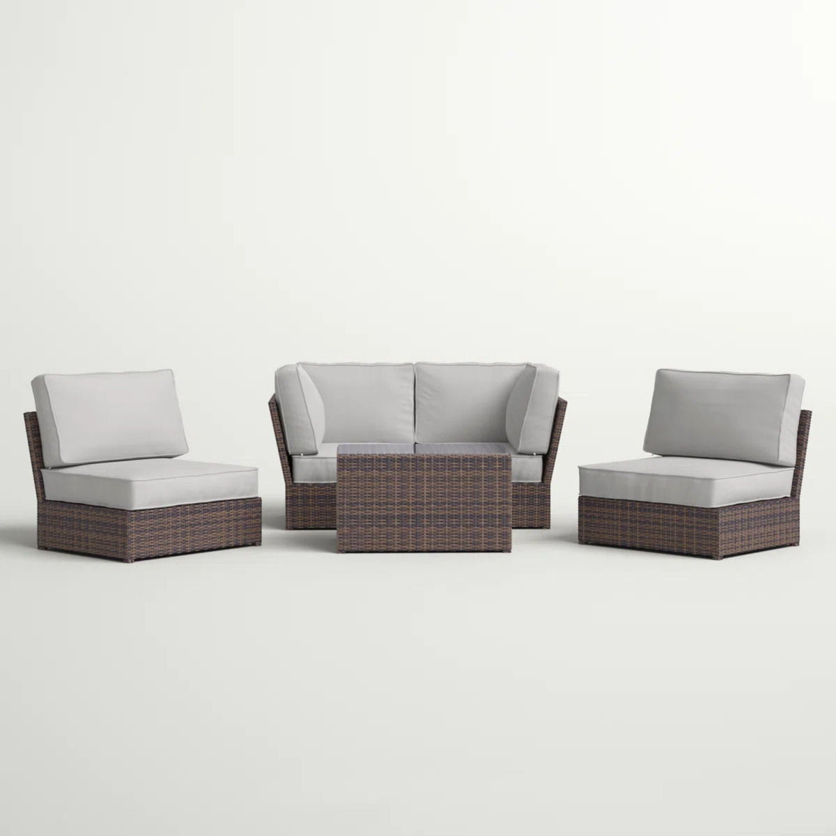 Comfortable modern patio rattan sectional set with cushions and a wicker coffee table on Tampa Home & Garden Store